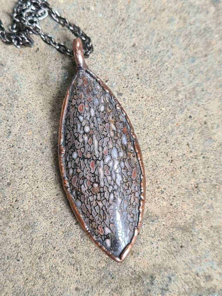 Fossilised Dinosaur Bone Pendant - Oval Gemstone - Copper Electroformed