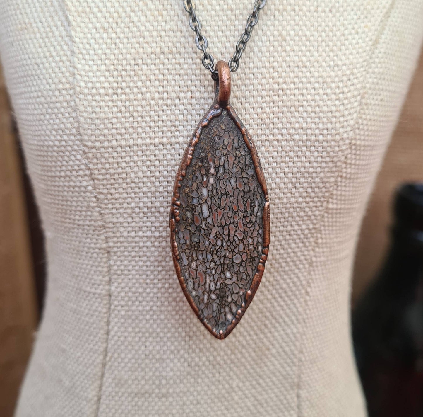 Fossilised Dinosaur Bone Pendant - Oval Gemstone - Copper Electroformed