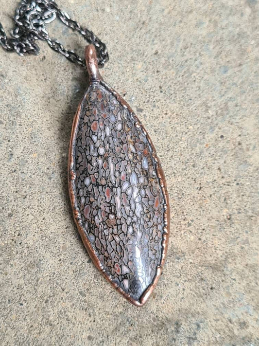 Fossilised Dinosaur Bone Pendant - Oval Gemstone - Copper Electroformed