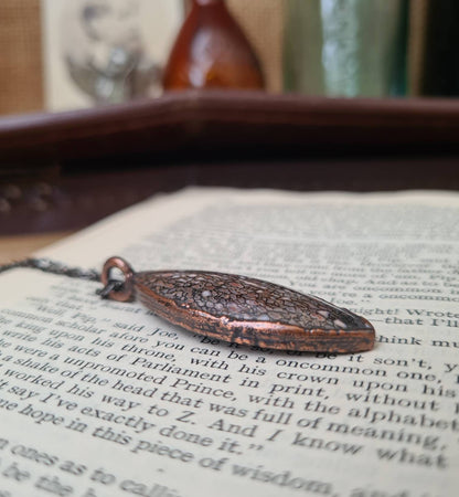 Fossilised Dinosaur Bone Pendant - Oval Gemstone - Copper Electroformed